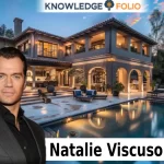 Modern living room of Natalie Viscuso’s Los Angeles home with large windows, elegant décor, and neutral color palette.