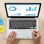 Entrepreneur reviewing market data to validate a startup idea